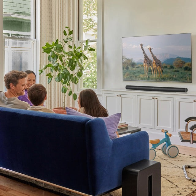 Sonos soundbar en speakers in een woonkamer